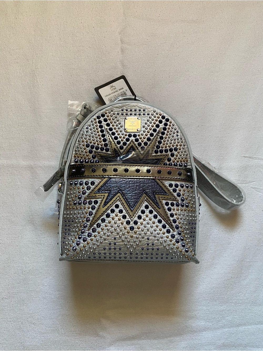 Metallic Silver Star-Stud Mini Backpack
(Limited Edition)